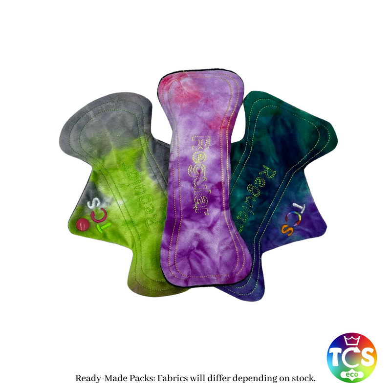 An example of a minky/plush Starter pack from TCS-eco. The Cloth Sanitary Pads have a brightly coloured minky/plush top fabric. The 3 pads are 8” in length and standard width, this starter pack contains 3 different TCS-eco cloth sanitary pads. Standard width shape Cloth Sanitary Pads have a width the same as a disposable sanitary pad.