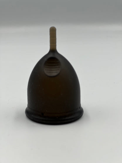 Large menstrual cup with stem and finger grips