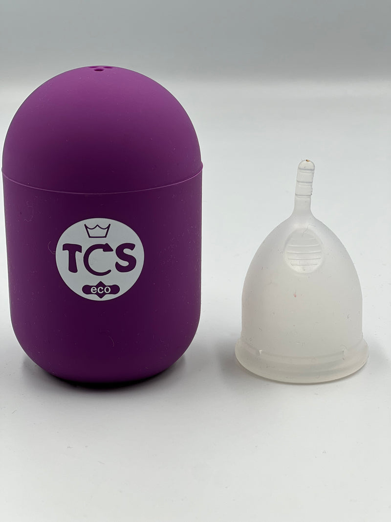 Menstrual cup with stem and finger grips and a cup steriliser.