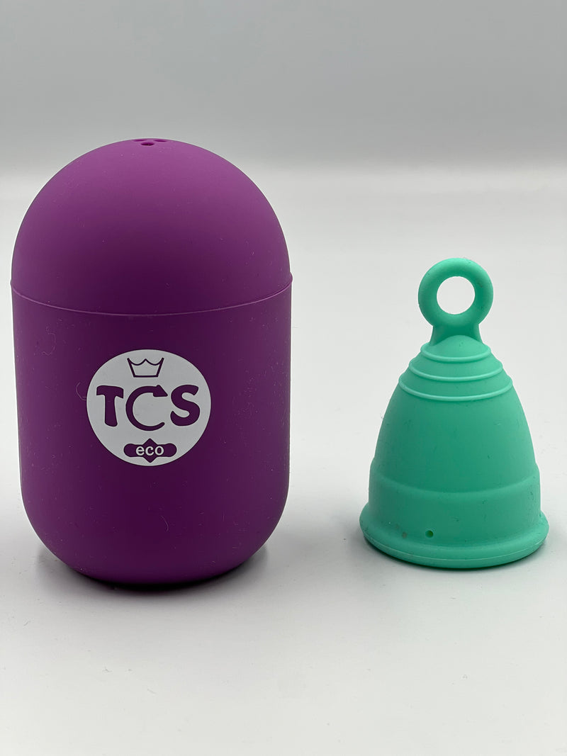 Adult menstrual cup with ring pull and menstrual cup steriliser