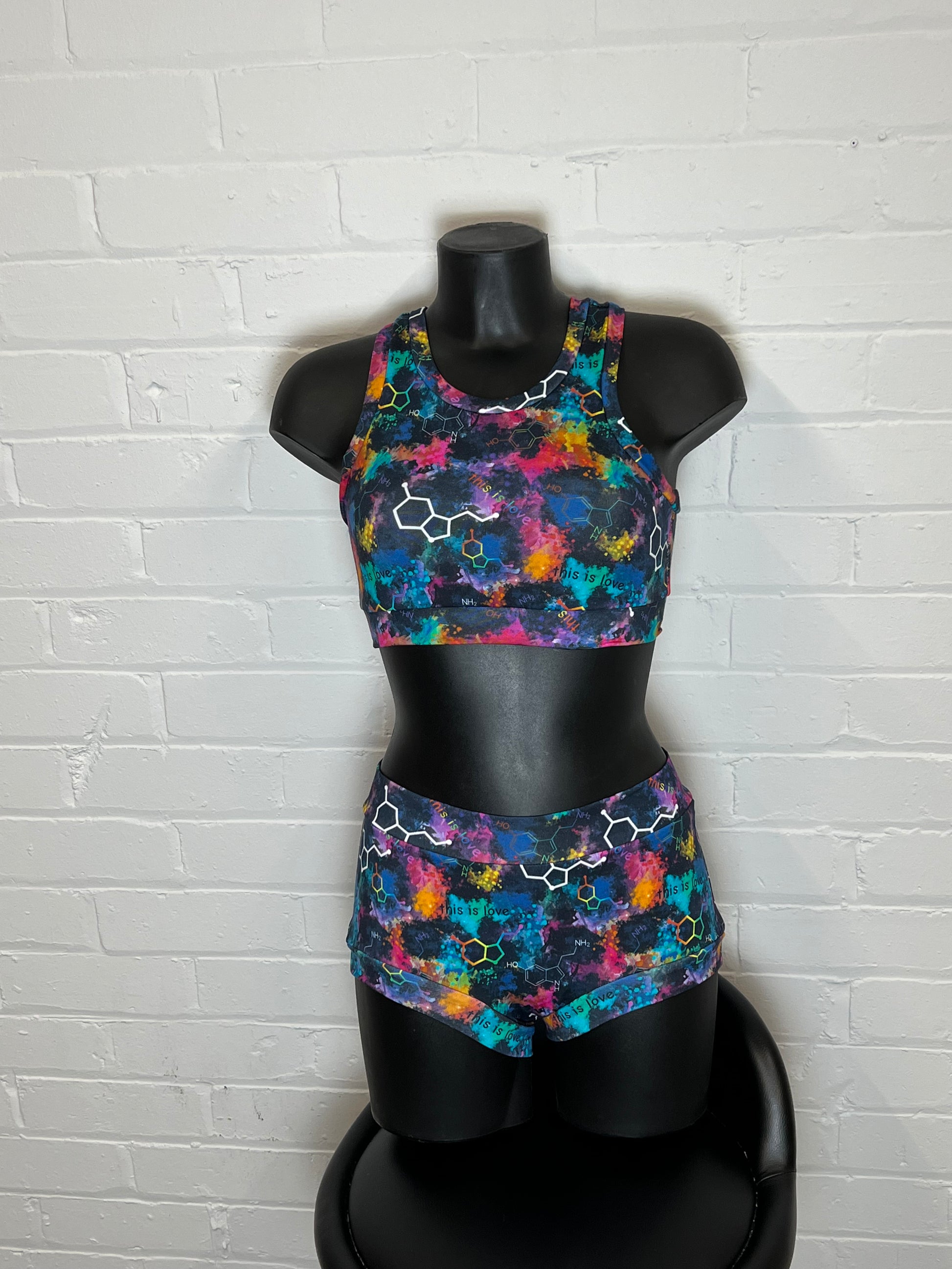 Underwear made using oxytocin custom cotton jersey. bralette and pants on a model.