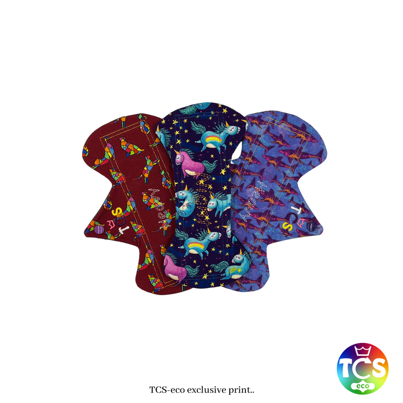 An example of a Cotton Jersey reusable Cloth Pad Starter pack from TCS-eco. The Cloth Sanitary Pads (CSP) have a brightly coloured printed top fabric. The 3 pads are 10” in length and standard width, this starter pack contains 3 different TCS-eco pad shapes 3 heavy absorbency. Wide width cloth sanitary pads have a width 0.25-0.5” wider than a disposable sanitary pad.