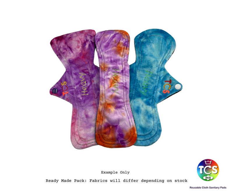 An example of a minky/plush Starter pack from TCS-eco. The Cloth Sanitary Pads have a brightly coloured minky/plush top fabric. The 3 pads are 11” in length and standard width, this starter pack contains 3 different TCS-eco cloth sanitary pads. Standard width shape Cloth Sanitary Pads have a width the same as a disposable sanitary pad.