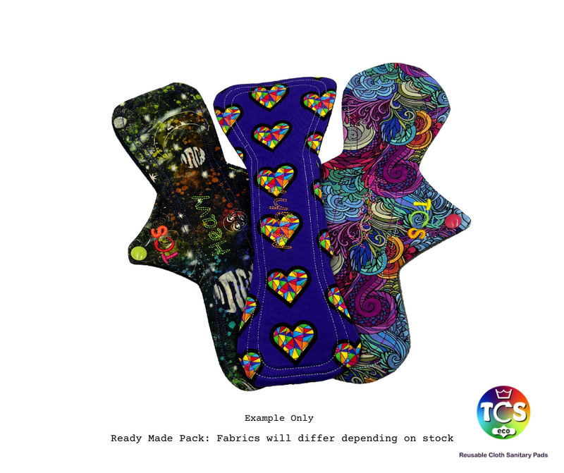 An example of a Cotton Jersey reusable Cloth Pad Starter pack from TCS-eco. The Cloth Sanitary Pads (CSP) have a brightly coloured printed top fabric. The 3 pads are 11” in length and standard width, this starter pack contains 3 different TCS-eco pad shapes 3 regular absorbency. Wide width cloth sanitary pads have a width 0.25-0.5” wider than a disposable sanitary pad.