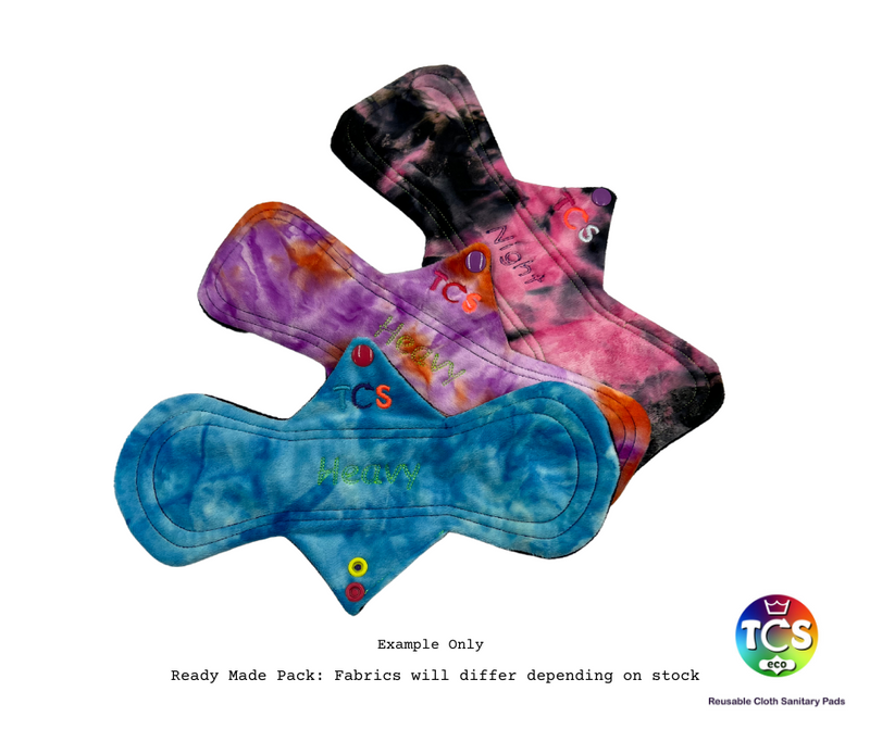 An example of a Minky Reusable Cloth Pad Starter pack from TCS-eco. The Cloth Sanitary Pads (CSP) have a brightly coloured hand dyed top fabric. The 3 pads are 11” in length and standard width, this starter pack contains 3 different TCS-eco pad shapes 3 heavy absorbency. Standard width pads are the same as a disposable.