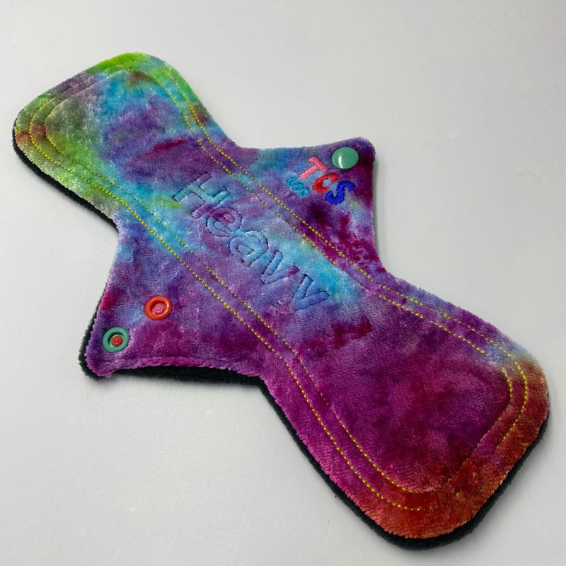 An example of a TCS-eco Cloth sanitary pad with a bright vibrant hand dyed bamboo velour.  All bamboo velour is hand dyed in the UK for TCS-eco Cloth Sanitary Pads.