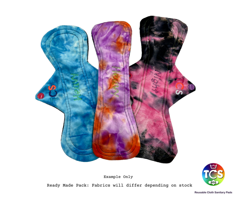 An example of a Minky Reusable Cloth Pad Starter pack from TCS-eco. The Cloth Sanitary Pads (CSP) have a brightly coloured hand dyed top fabric. The 3 pads are 11” in length and standard width, this starter pack contains 3 different TCS-eco pad shapes 3 heavy absorbency. Standard width pads are the same as a disposable.