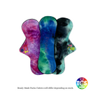 An example Starter pack from TCS-eco.  The Cloth Sanitary Pads with a brightly coloured cotton Jersey top fabric.  The 3 pads are 9 inch in length and slim width.  This shape is designed for smaller framed people.  These cloth sanitary pads are designed for teenagers and smaller framed people. 9 inch pads are the most popular length of day disposable.