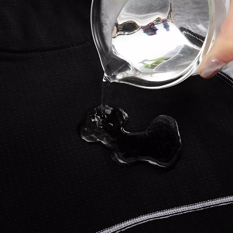 Period pants diamond mesh and water being shown to demonstrate the super absorbency